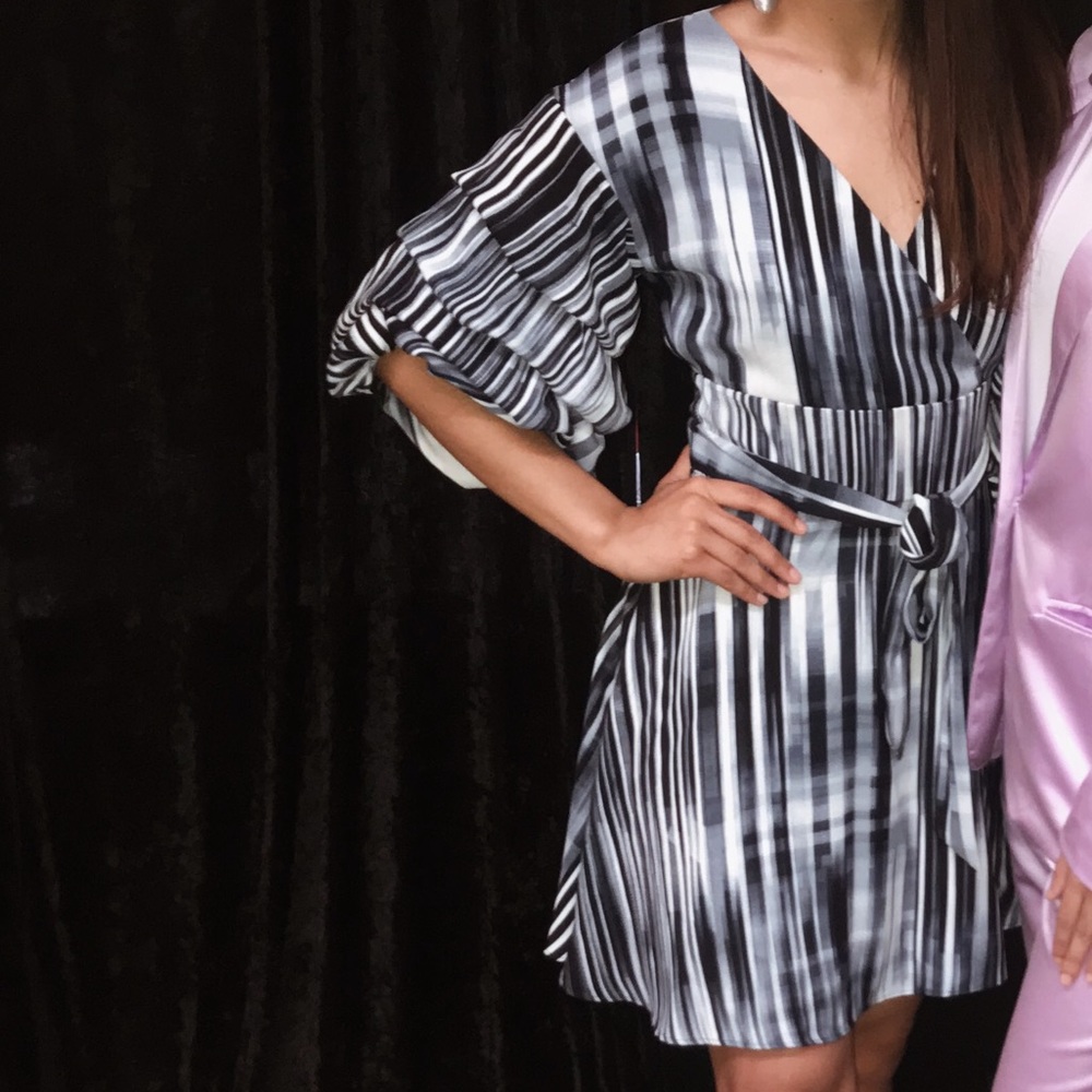Black and white ruffled sleeved dress